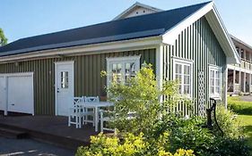 Lilla gröna huset på gården